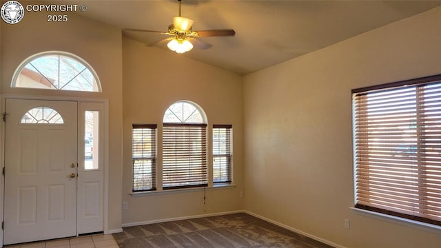 1002 Cedarcrest Dr, Pueblo, CO 81005 - entrance foyer with plenty of natural light, carpet, ceiling fan, and lofted ceiling