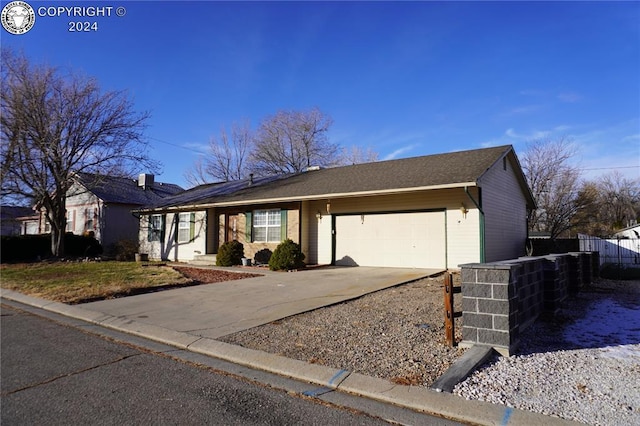 single story home with a garage