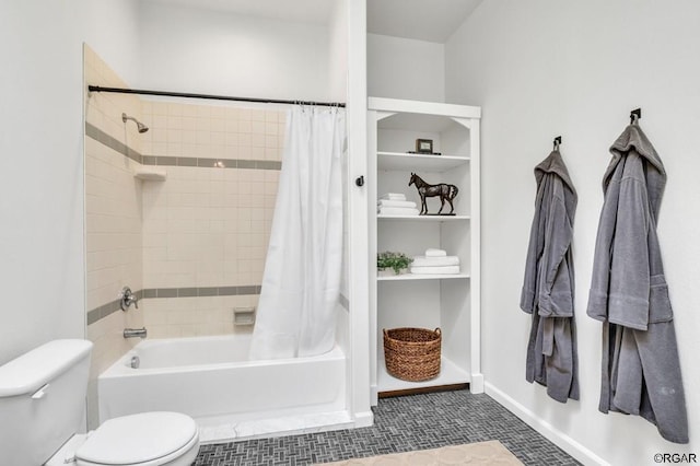 bathroom with tile patterned floors, toilet, and shower / bath combo with shower curtain