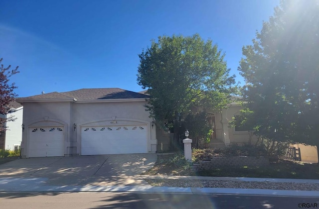 view of front of home with a garage