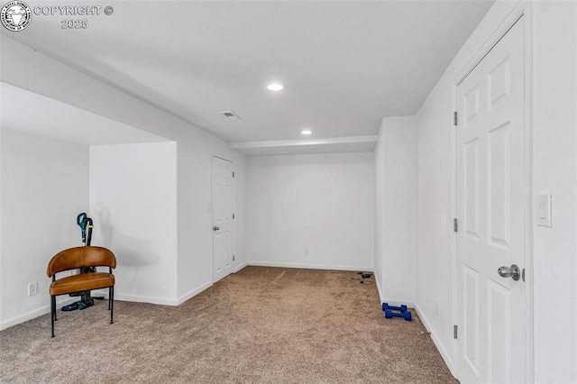 carpeted empty room with visible vents, recessed lighting, and baseboards