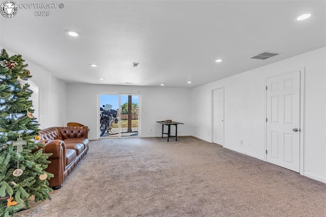 sitting room featuring recessed lighting, carpet, visible vents, and baseboards