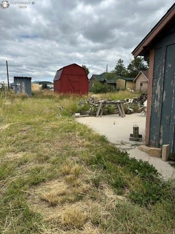 40 Vista Dr, Westcliffe, CO 81253 - view of yard featuring a storage unit and an outbuilding