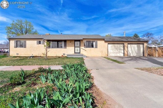 1815 N 10th St, Canon City, CO 81212 - single story home with concrete driveway, stucco siding, crawl space, a garage, and fence