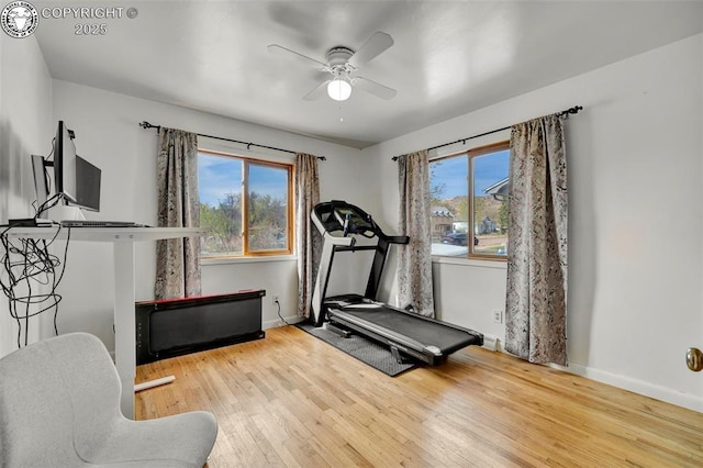 1815 N 10th St, Canon City, CO 81212 - workout room with baseboards, a ceiling fan, and wood finished floors