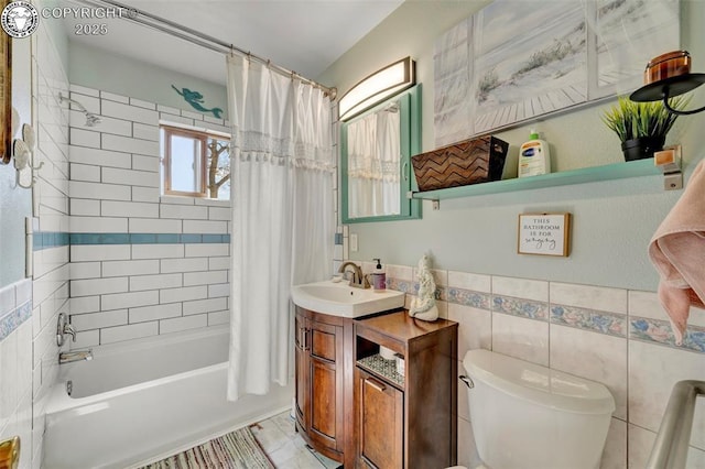 1815 N 10th St, Canon City, CO 81212 - bathroom featuring toilet, shower / tub combo, vanity, and tile walls