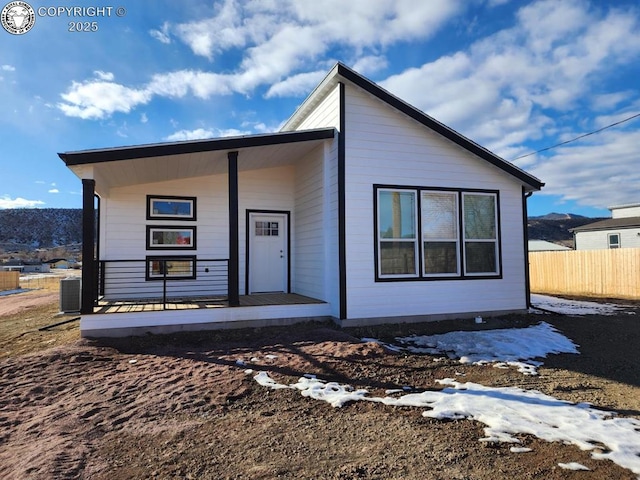 view of front facade with a mountain view and a porch