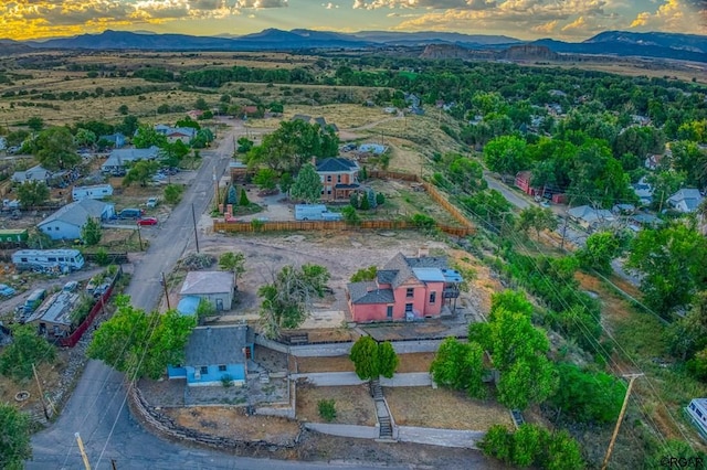 aerial view at dusk with a mountain view