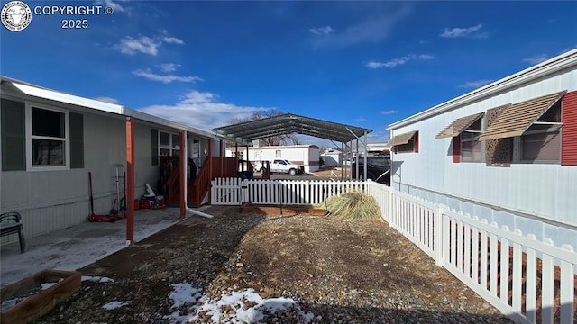 view of yard featuring a carport