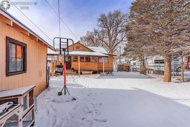 view of yard covered in snow