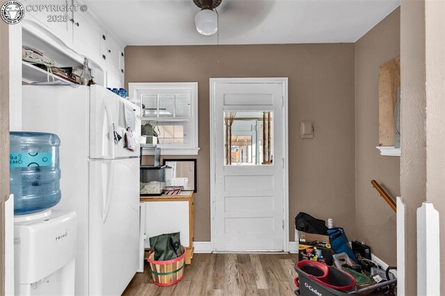 entryway with light hardwood / wood-style flooring