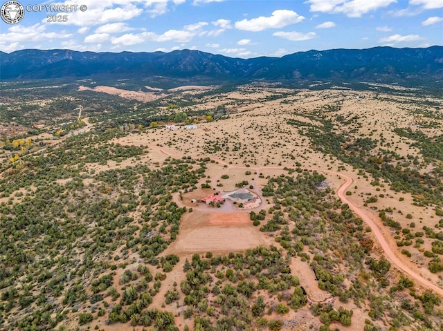 bird's eye view with a mountain view