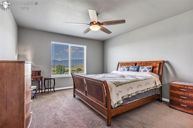 3528 Telegraph Trl, Canon City, CO 81212 - bedroom with carpet floors, a ceiling fan, and a textured ceiling