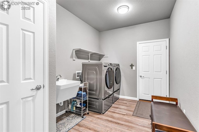 3528 Telegraph Trl, Canon City, CO 81212 - laundry room with separate washer and dryer and wood finished floors