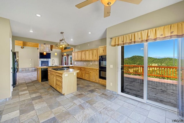 kitchen with black appliances, hanging light fixtures, kitchen peninsula, a kitchen island, and backsplash