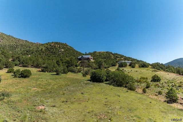 property view of mountains with a rural view