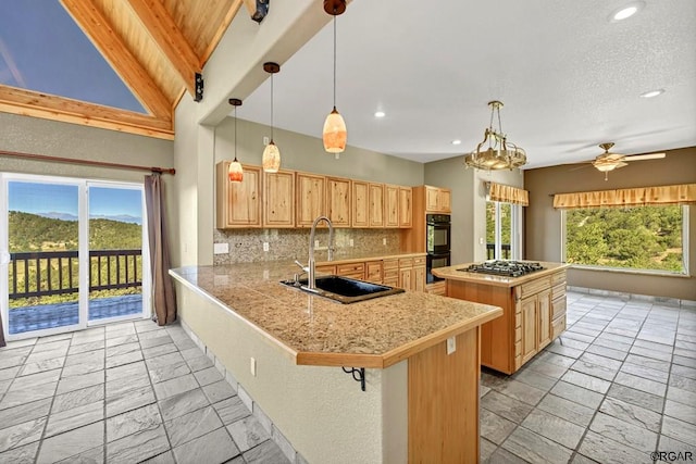 kitchen featuring sink, a breakfast bar, lofted ceiling with beams, decorative backsplash, and kitchen peninsula