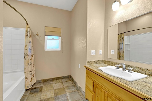 bathroom with vanity and shower / bath combo with shower curtain