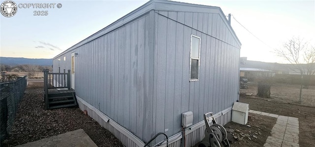 view of property exterior at dusk