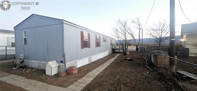 view of home's exterior with a mountain view