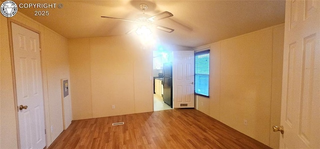 unfurnished room featuring wood-type flooring and ceiling fan