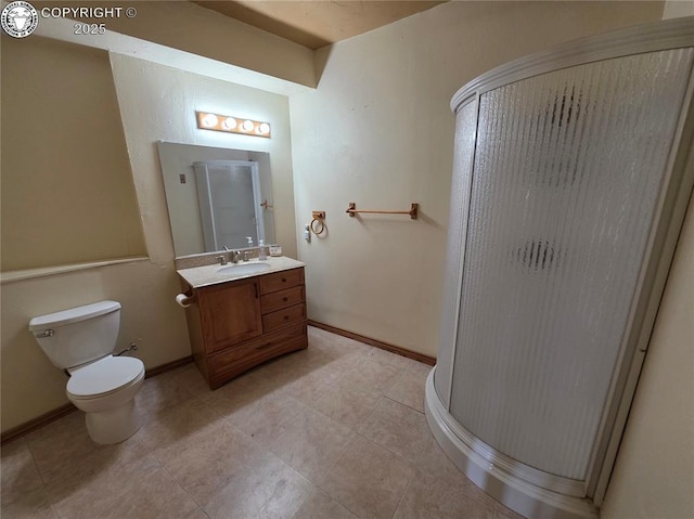 612 Lowry Ln, Canon City, CO 81212 - bathroom featuring a stall shower, vanity, and tile patterned flooring