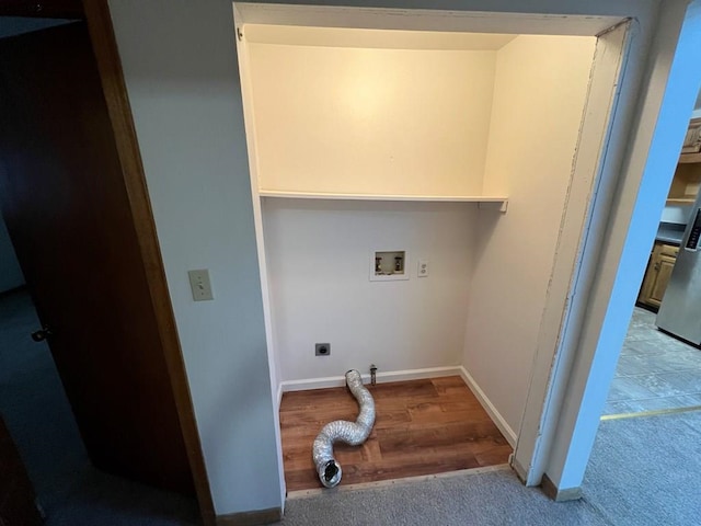 clothes washing area with hookup for a washing machine, light carpet, and electric dryer hookup