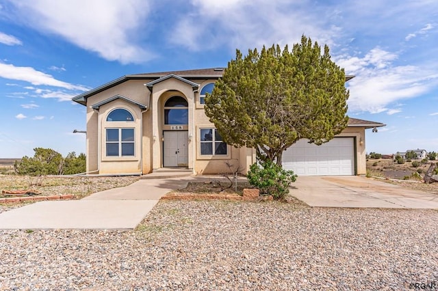 view of front of home with a garage