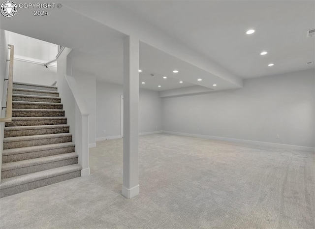 basement with light carpet