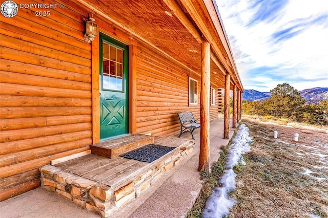 property entrance featuring a mountain view