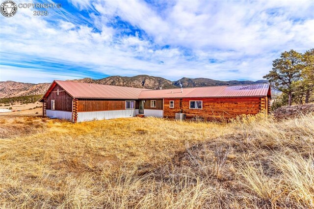 log-style house featuring a mountain view