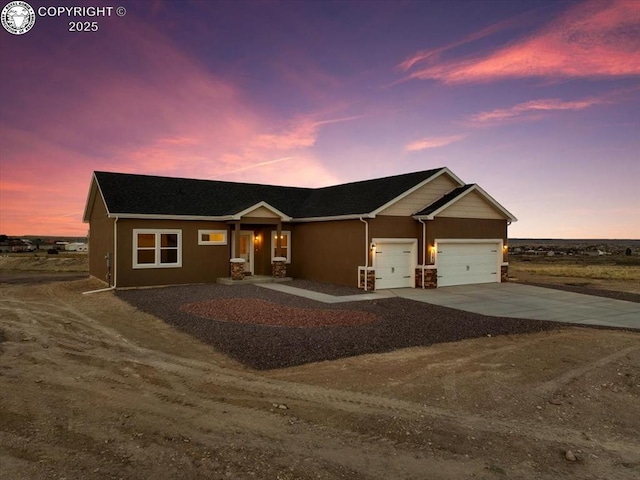 view of front of property featuring a garage