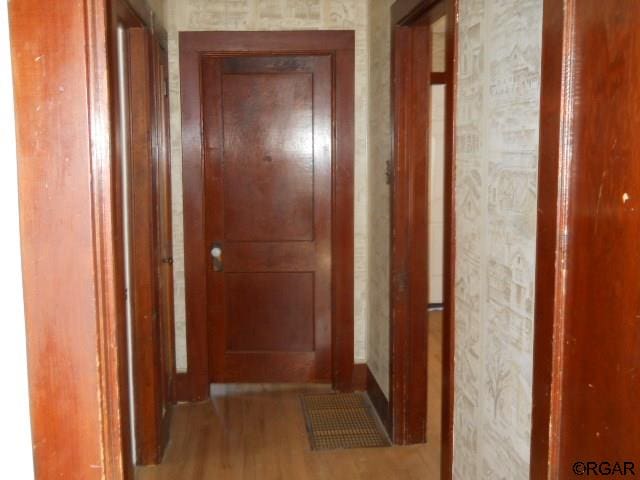 hallway featuring light hardwood / wood-style floors