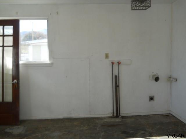 laundry room with washer hookup and hookup for an electric dryer