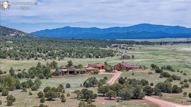 property view of mountains featuring a rural view