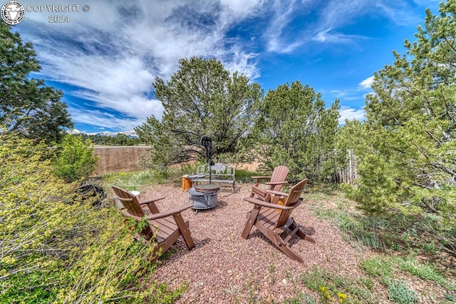 view of yard featuring a fire pit