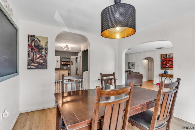 dining room featuring light hardwood / wood-style flooring