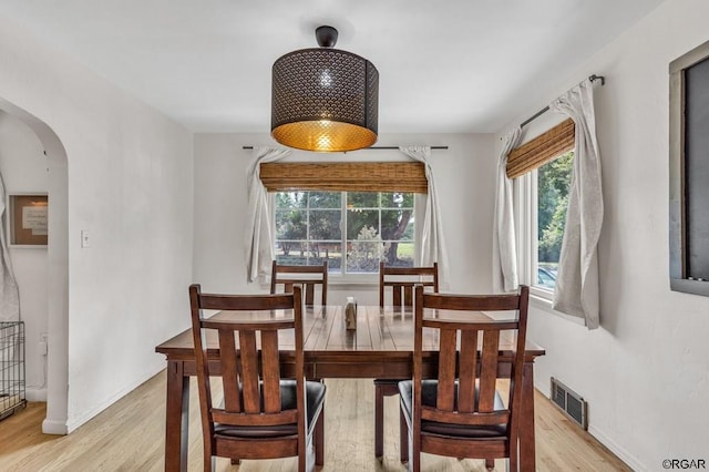 dining room with light wood-type flooring