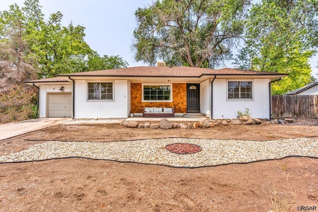 single story home with a garage