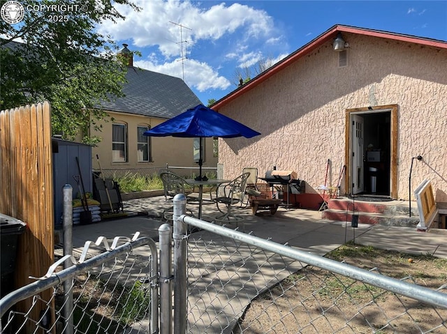 529 W Main St, Florence, CO 81226 - view of patio / terrace featuring a gate