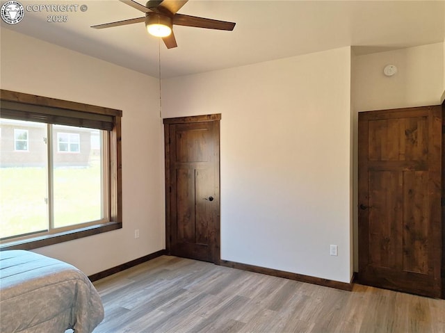 201 Fox Run, Silver Cliff, CO 81252 - bedroom with light wood-type flooring and a ceiling fan