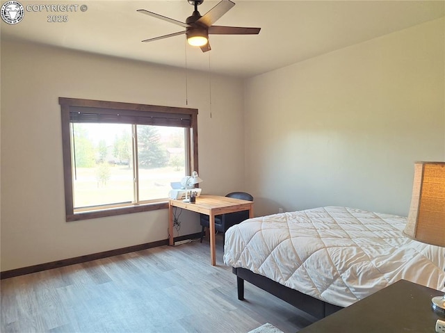 201 Fox Run, Silver Cliff, CO 81252 - bedroom with wood finished floors and ceiling fan