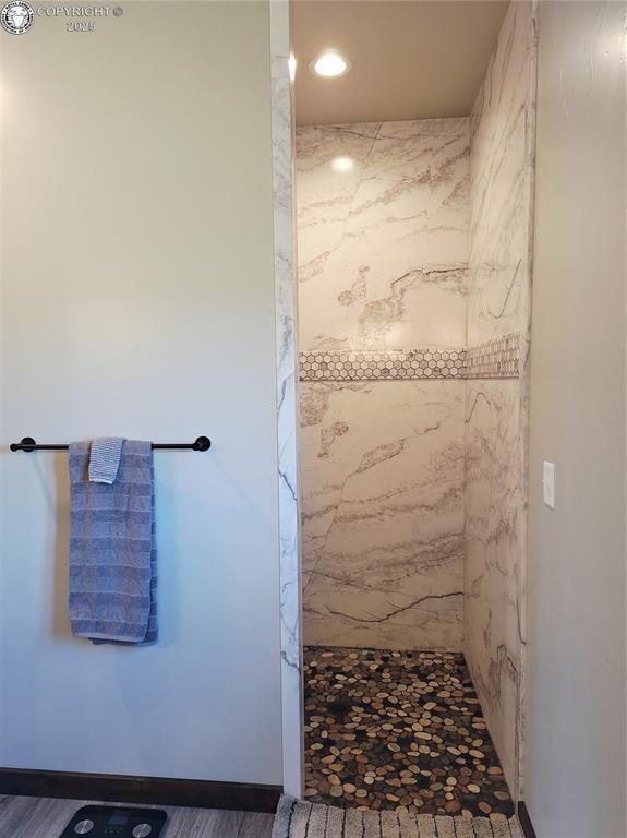 201 Fox Run, Silver Cliff, CO 81252 - full bathroom with a marble finish shower and recessed lighting