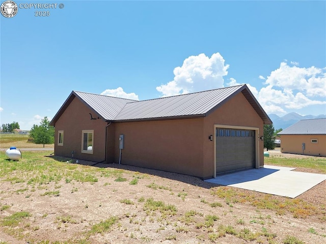201 Fox Run, Silver Cliff, CO 81252 - view of property exterior featuring a metal roof and stucco siding