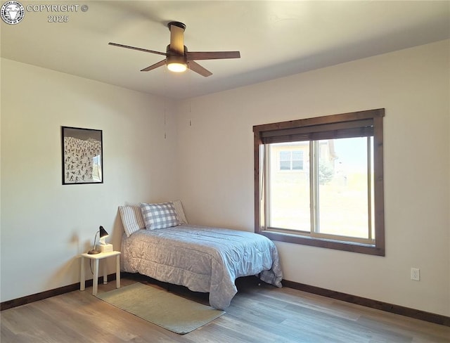 201 Fox Run, Silver Cliff, CO 81252 - bedroom featuring wood finished floors and a ceiling fan