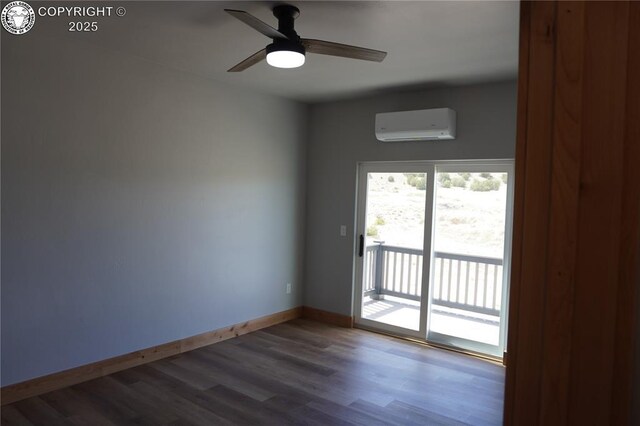 197 High Meadows Dr, Florence, CO 81226 - unfurnished room with a wall mounted AC, wood finished floors, baseboards, and a ceiling fan