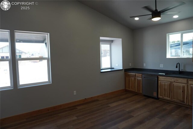 197 High Meadows Dr, Florence, CO 81226 - kitchen with dishwasher, a sink, vaulted ceiling, dark wood-style floors, and dark countertops