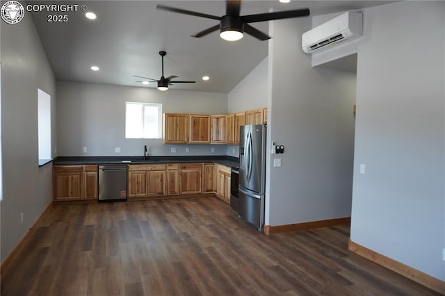 197 High Meadows Dr, Florence, CO 81226 - kitchen featuring stainless steel appliances, a sink, a ceiling fan, a wall mounted AC, and dark countertops