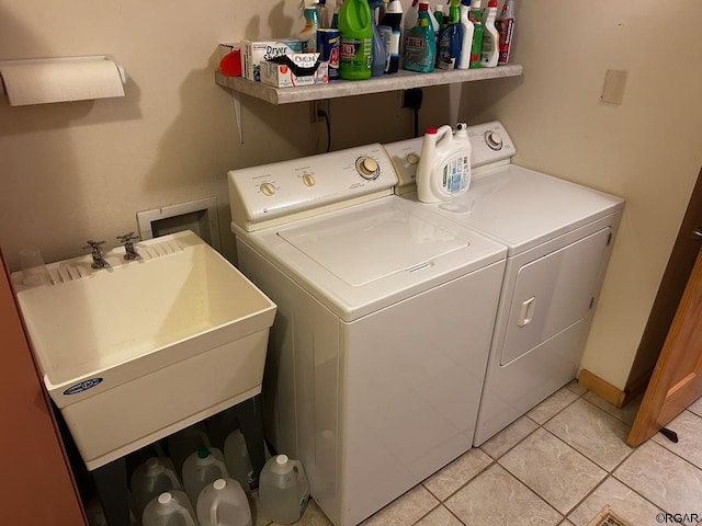 2 Inverness Ave, Westcliffe, CO 81252 - laundry room with washer and dryer and light tile patterned floors