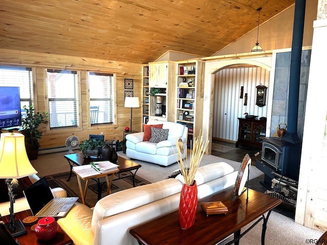 living room with lofted ceiling, wooden ceiling, baseboard heating, a wood stove, and wooden walls